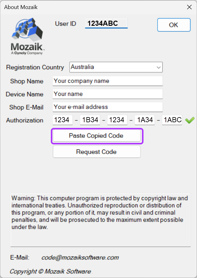 SCREENSHOT: The About dialog showing the pasted code and the Green Tick verification